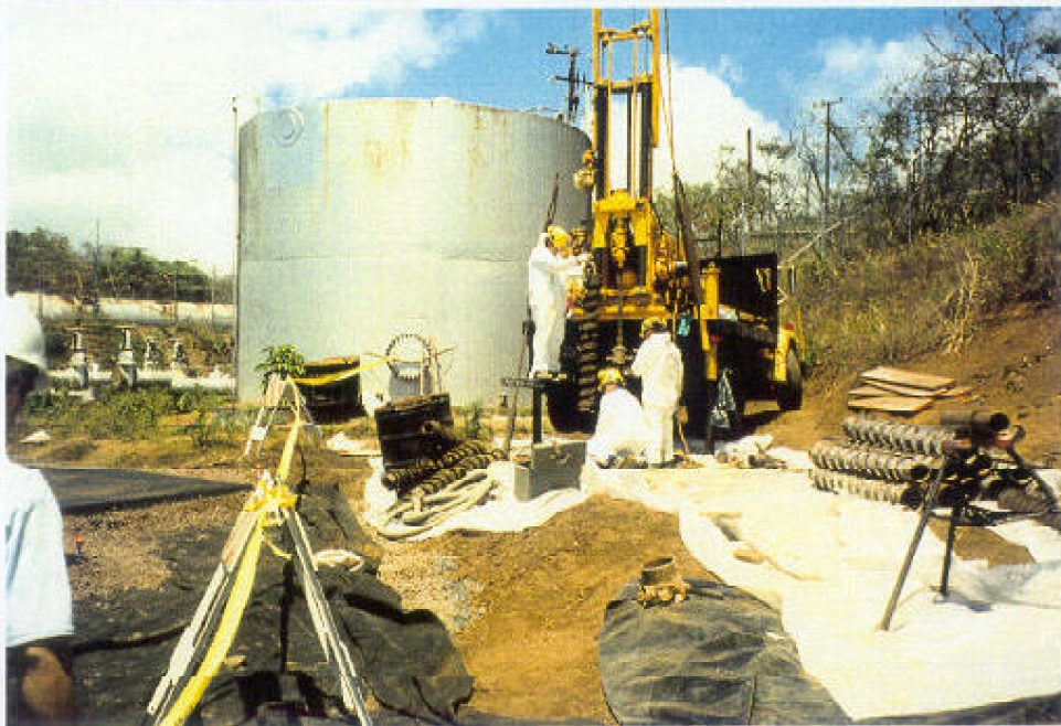 Drillers installing a groundwater monitoring well at the Former OWDF in 1991